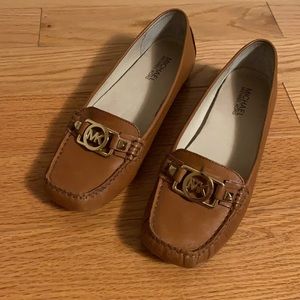 Michael Kors flat leather loafers.